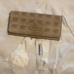 Authentic Chanel Canvas Traveline Wallet with inclusion